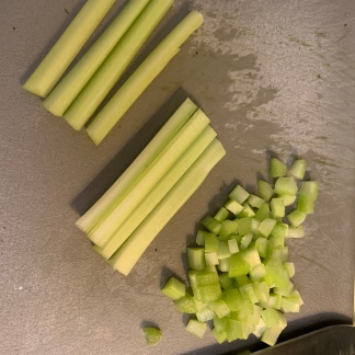 Halved, quartered and diced celery